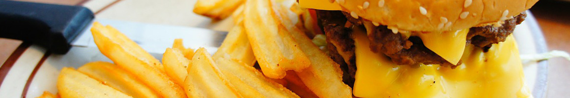 Eating Burger at Jims Super Burgers restaurant in Anaheim, CA.